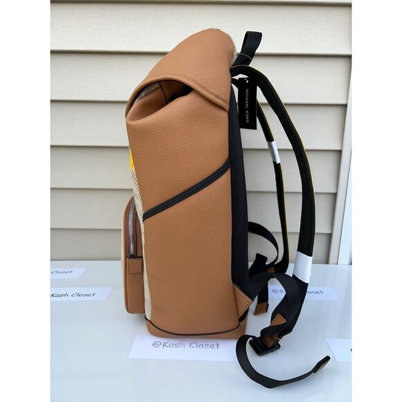 cooper embossed faux leather and logo stripe backpack MICHAEL KORS || – FASHION MYST while an outside zip compartment and side slip pockets offer easy access to smaller essentials Cooper Logo and Striped Backpack